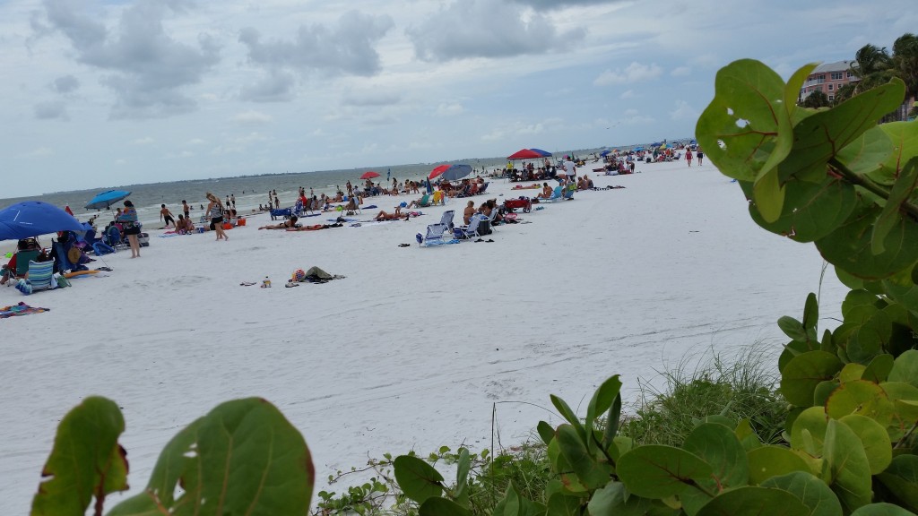 Sunbathers enjoying Fort Myers Beach