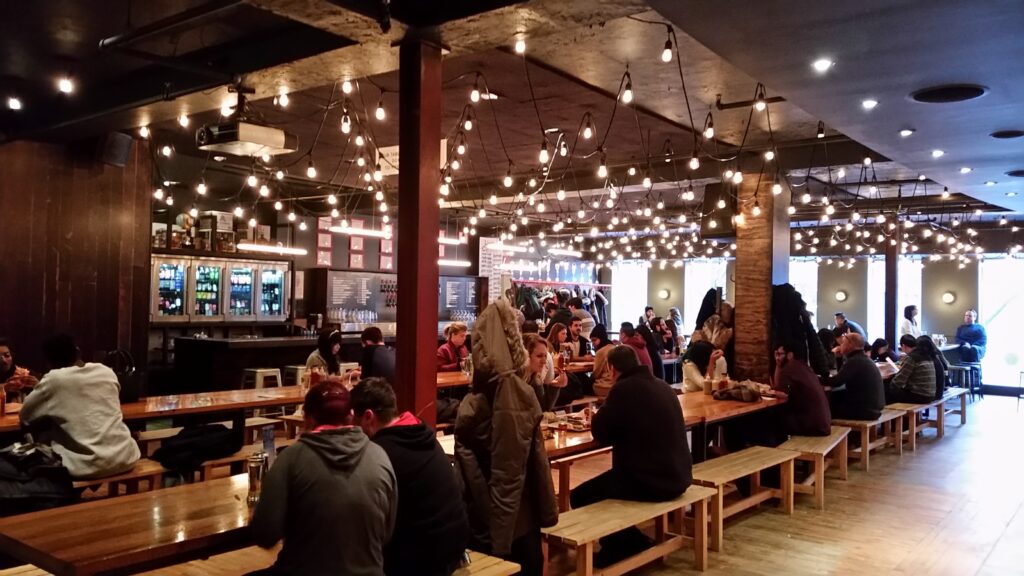 Dining area at Wvrst Beer Hall, Tornoto, Canada