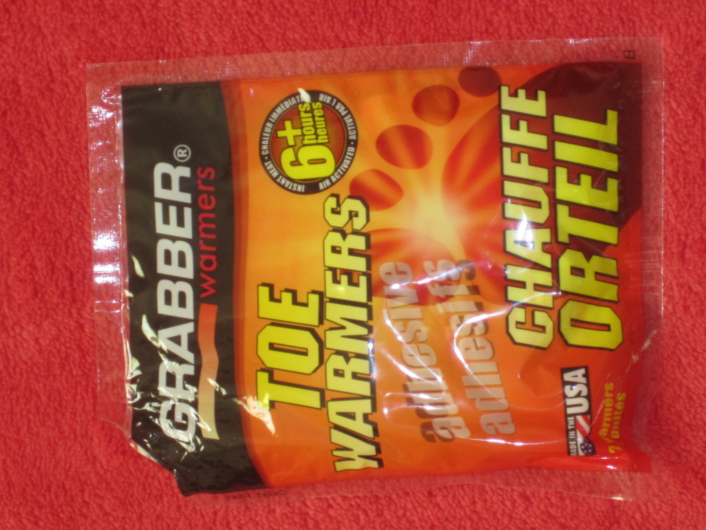 Look for the Grabber brand of toe warmers and stick them over your socks in the area below your toes.