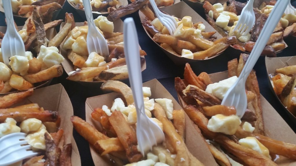 Sample trays of poutine in Montreal