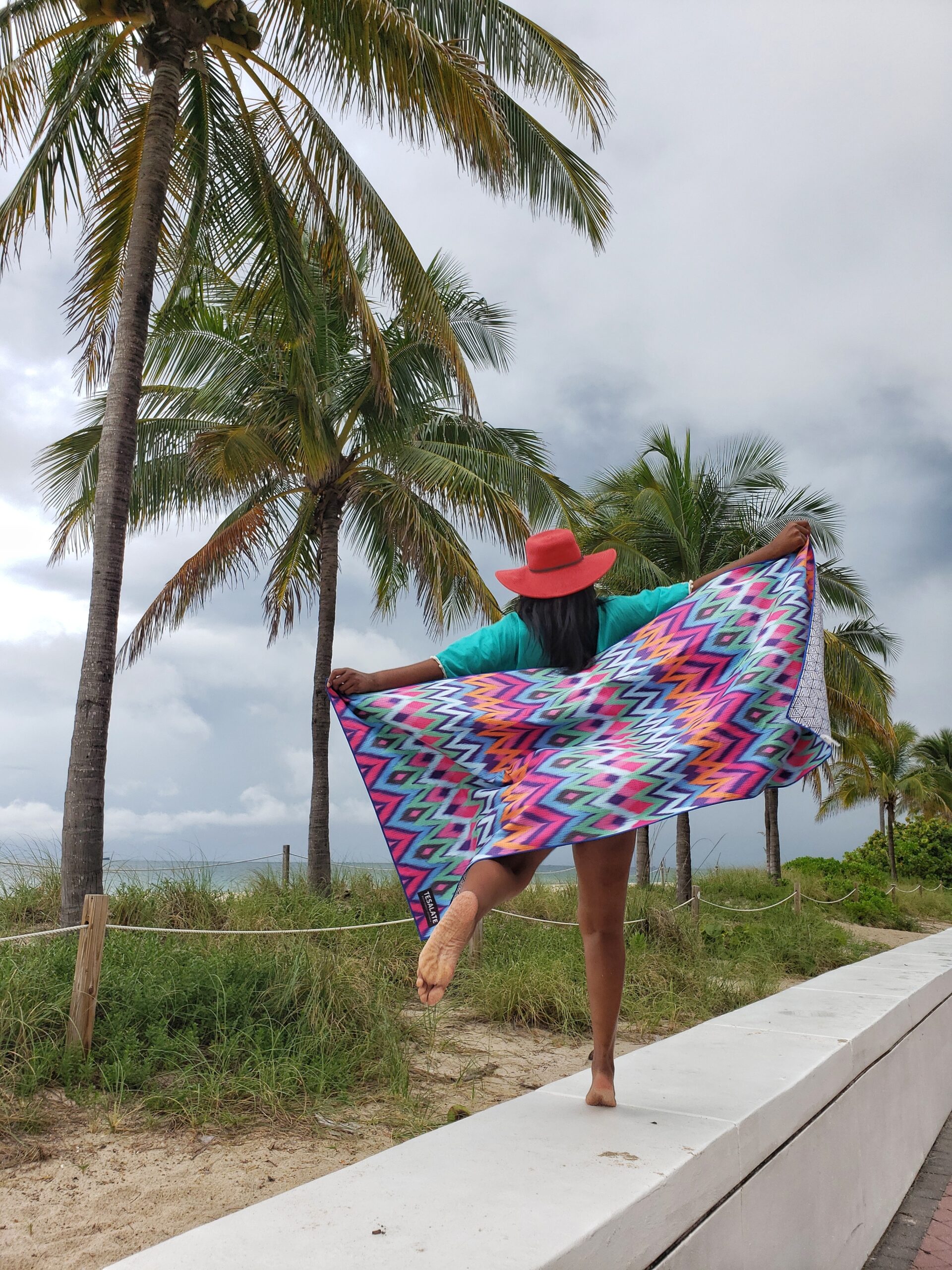 Jumping for joy with Tesalate sand free towel